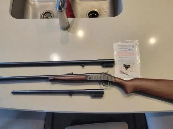 New England Firearms Pardner Tracker II w/multiple barrels
