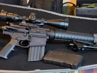 *NEW LOWER PRICE* $1400 - Smith & Wesson M&P10 in EXCELLENT CONDITION. A free-float handgu Ruger Precision two-stage AR trigger, a muzzle device. Includes a NIKON 4X16 M308 SCOPE, 7 MAGAZINES, TRIPOD, 12+ BOXES of AMMUNITION-LOWER PRICE **FOR SALE $1400**