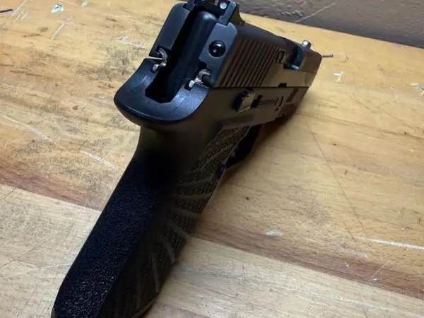 Sig Sauer P250 9mm 3.6" w/ (2) Wilson Combat Modules and (1) mag1