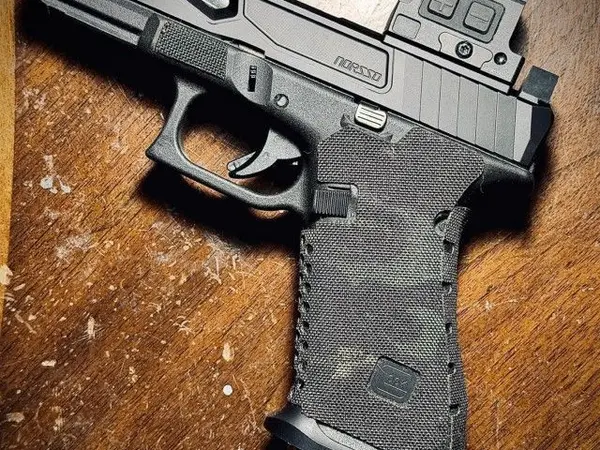 Glock 45 with Aimwin Enclosed optic and Norsso slide