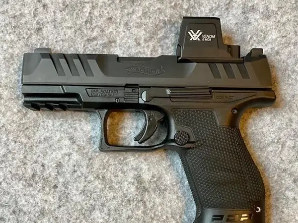 Walther PDP LE W/optional New Vortex Enclosed red dot.