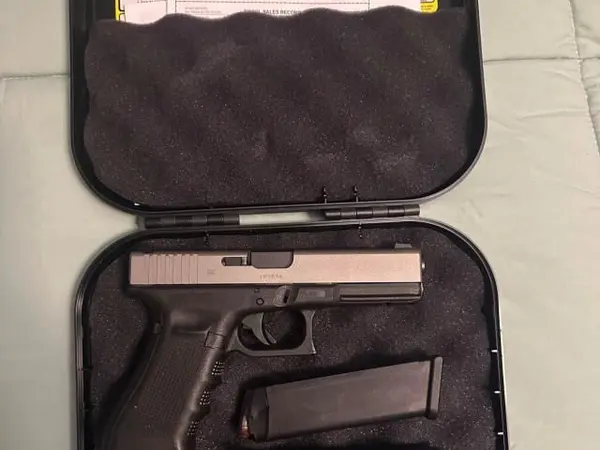 **Cerakoted G22 Gen 4, Trijicon green night sights, 3 mags and 150 rds of Hornday Ammo**