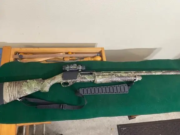 Benelli Nova 12ga Realtree/Cabela’s Red dot Scope