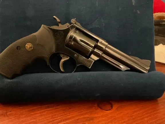 Smith and Wesson , 4 inch, .357
