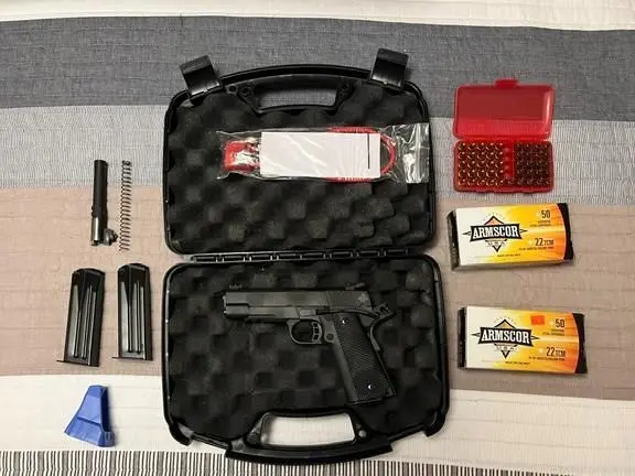 PPK and 22TCM/9mm Pistols