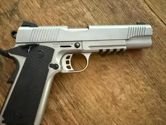 Tisas stainless duty 1911 with rail