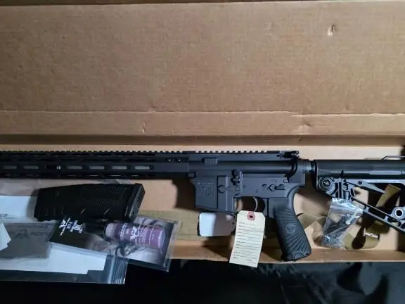 Wilson Combat rifle in 5.56. Never fired