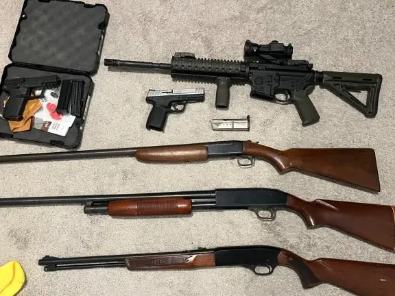 A couple shotguns and an AR15
