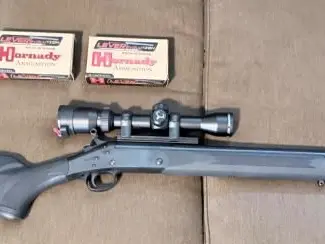 H&RHANDI-RIFLE WITH SCOPE AND 2 BOXES OF AMMO
