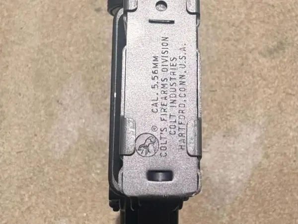 Pre-Ban 1981 Colt SP1 .223/5.56 rifle, triangular handguard, slab side, no shell deflector, trapdoor buttstock