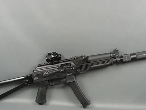 Kalashnikov Model K9 9mm Rifle w/Folding Stock, Faux Suppressor, & Red Dot