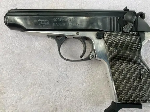 FEG .380 ACP with carbon fiber grips AM/FM 8 Track