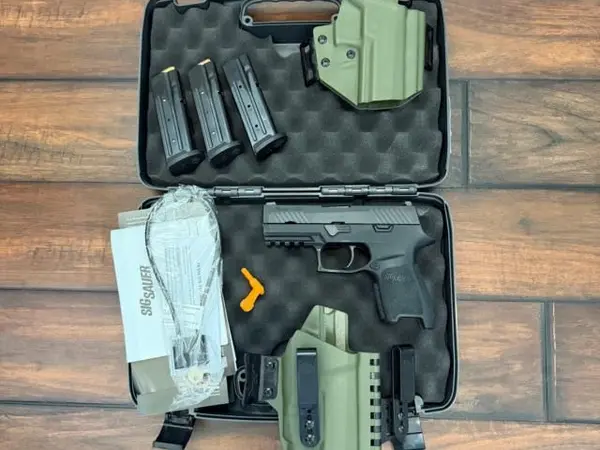 Sig P320 with night sights and extras- like new