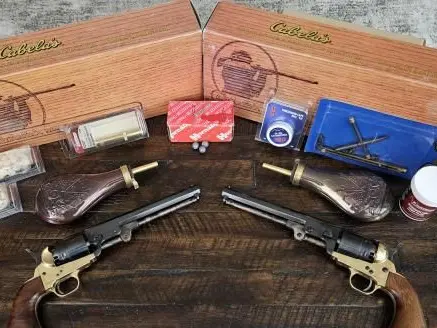 Pair of Pietta 1851 revolvers + accessories