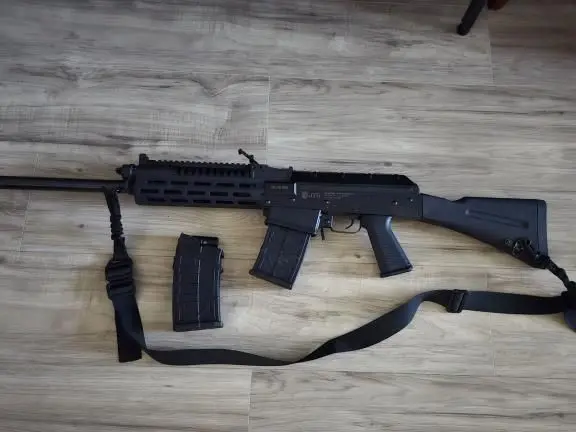 JTS M12AK 12GA AK style semi-auto shotgun with 100 round of ammo and strap