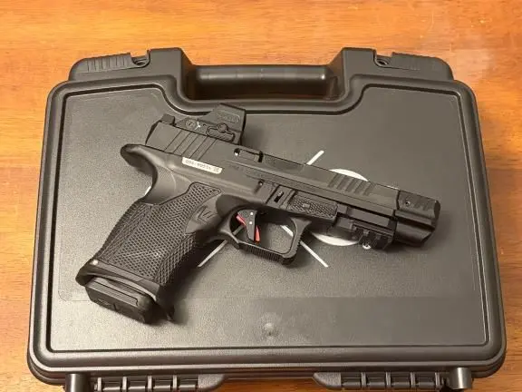 Ruger RXM w/ Icarus grip & addons