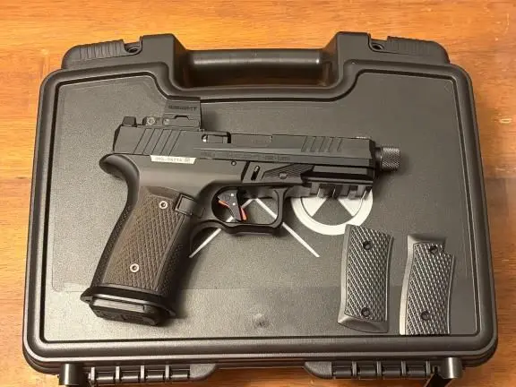 Ruger RXM w/ Sharps Bros. grip & addons.