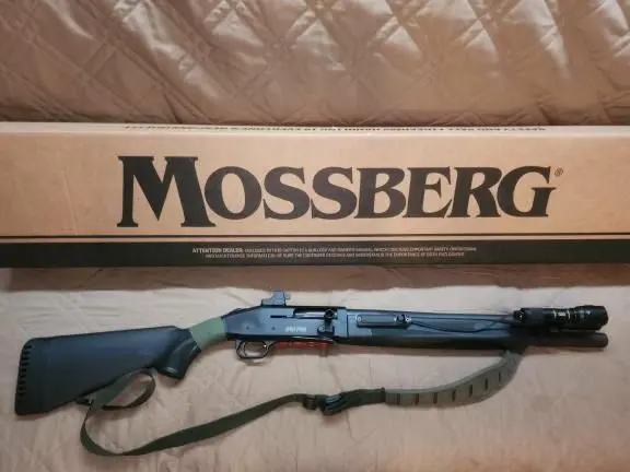 Mossberg 940 Pro Tactical with Holosun, Streamlight, sling and ammo card.