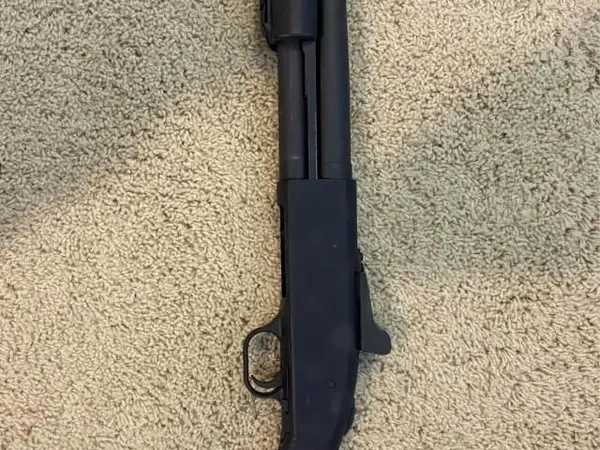 Mossberg 590 12 GA Tactical (9-Shot) – 20" Barrel, Ghost Ring Sights, SpeedFeed Stock, Tri-Rail