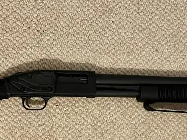Mossberg Shockwave 12GA with laser saddle