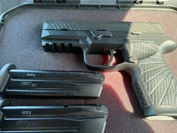 Sig P320 with Wilson Combat Frame, 2 17rd magazines