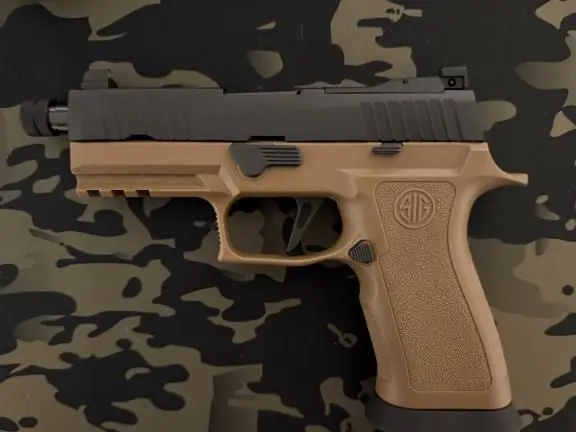 Sig P320 with upgraded trigger and threaded barrel