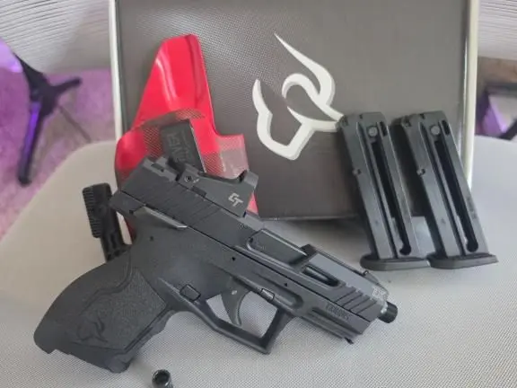 like new Taurus TX22 T.O.R.O ,Optic, 2 mags, threaded barrel attachment, and red hill tactical holster