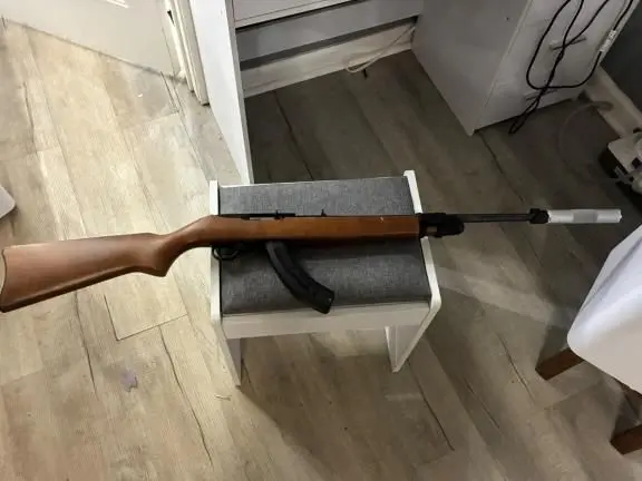 Ruger 10/22 W/T Ruger lazer and suppressor