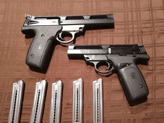 Two smith and wesson pistols