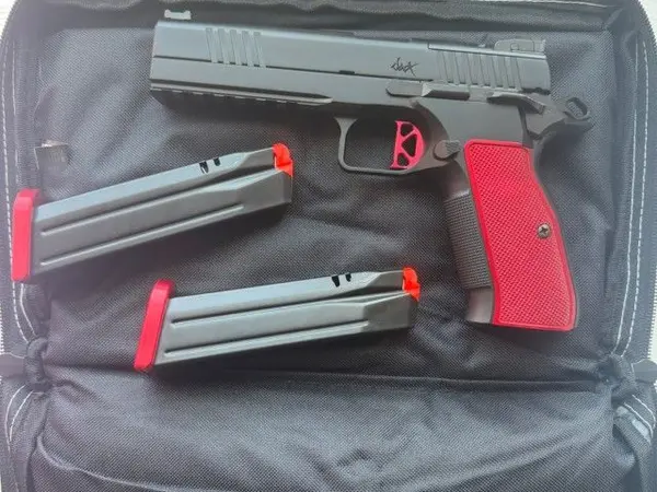 Dan Wesson DWX w/ a red grip