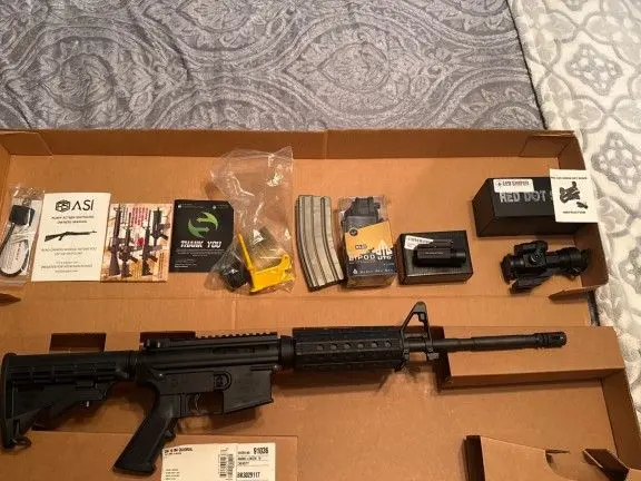 Bushmaster CM 15 M4 Quadrail