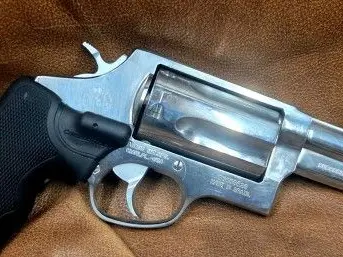 Taurus Judge Stainless High Polish w/ Crimson Trace Grips...