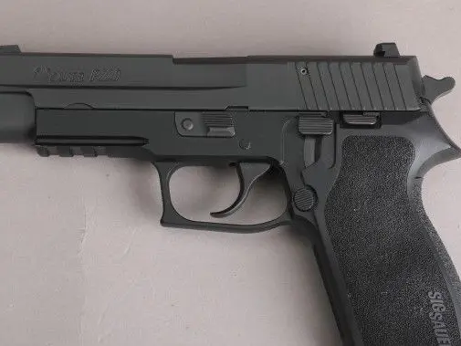 Sig Sauer P220, Like New in box with E2 grips upgrade and two 10 round mags