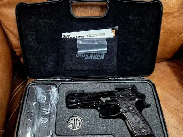 Sig SXG Reserve, Black DLC Coated, Integrated Compensator...w/ Trijicon RMR...