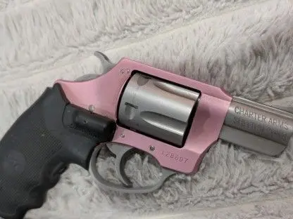 Pink lady with crimson trace grip