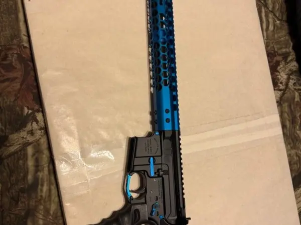 7.62 AR rifle with blue furniture