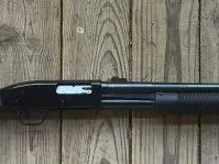 Mossberg Maverick 12 gauge Slug/buckshot w/rifle sights