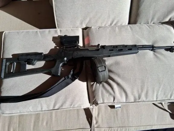 SKS Rifle with synthetic stock and drum magazine