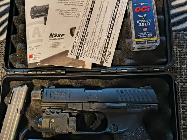 Walter PPQ 22 caliber pistol with threaded barrel