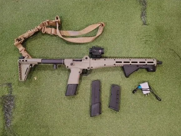 Kel Tec Sub 2000 Gen 3 5.7x28 with 3 mags, sling, red dot, and light handguard