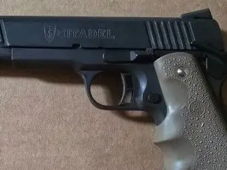 1911 Citadel .45 ACP pistol with Hogue Grips