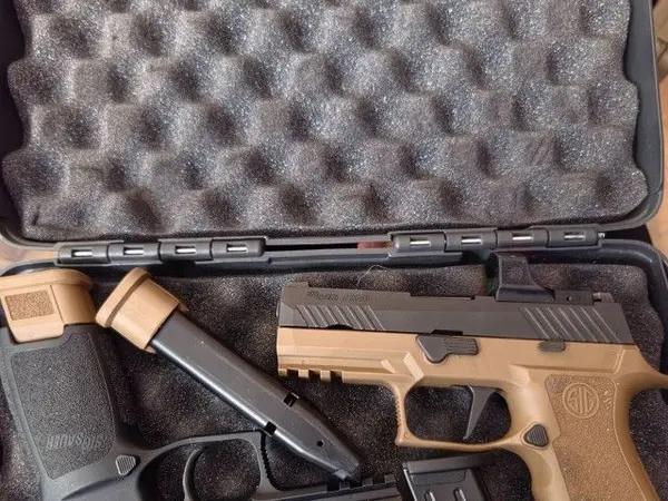 PAIR OF SIG 320s with Sig Optics!