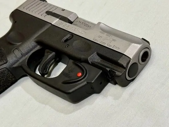 Taurus G2c with 6 mags and laser