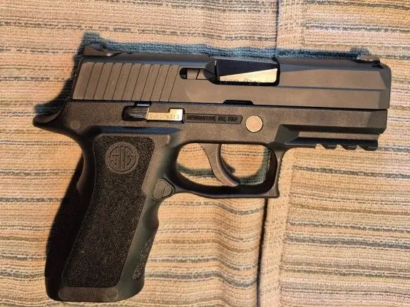 Sig Sauer P250 9mm hammer fired pistol