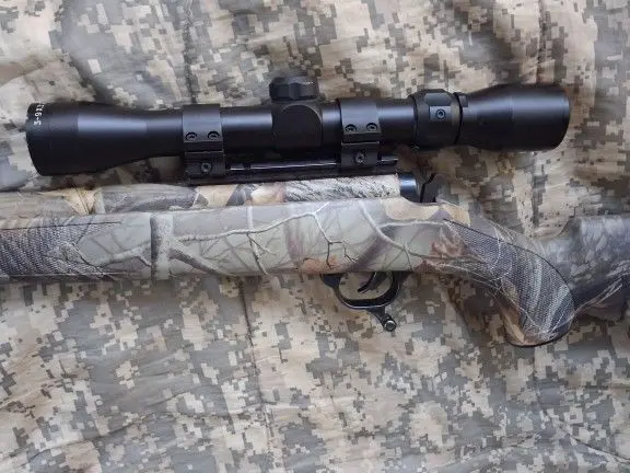 Thompson center Omaga in line factory camo.50.cal.like new..