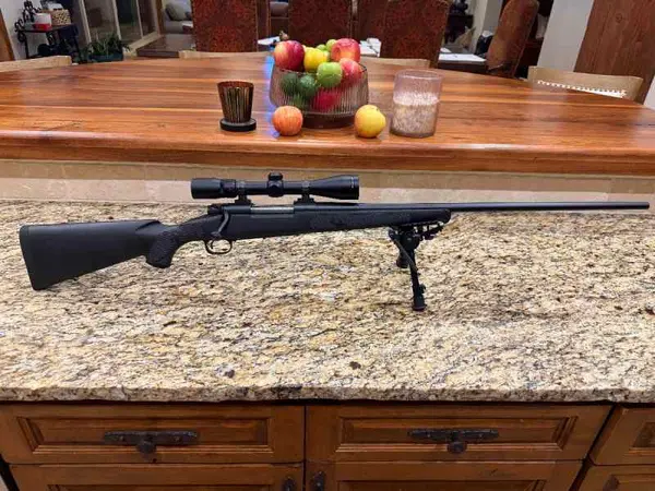 Winchester model 70 - 7mm rem mag w Nikon scope