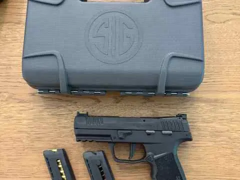 Sig P322 with two 20-round mags