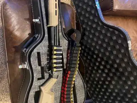 Mossberg 500 w\ extras including Guitar case