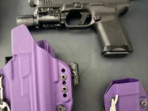 CANIK TP9 with holster and surefire light
