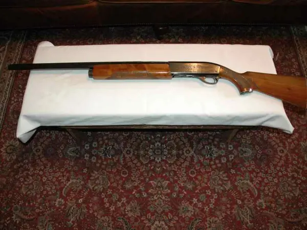 Remington 1100 12 gauge 26" barrel reduced